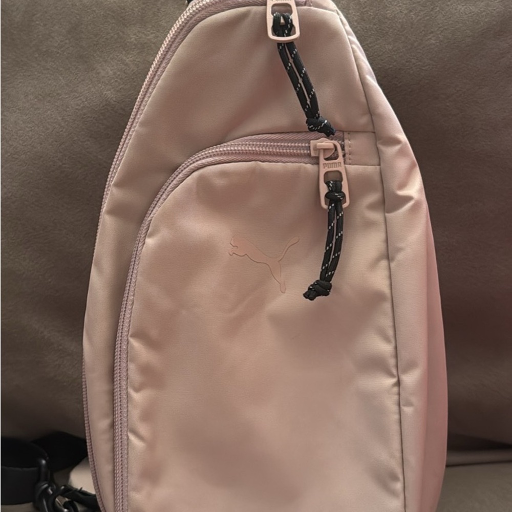 Puma cream colored sling bag